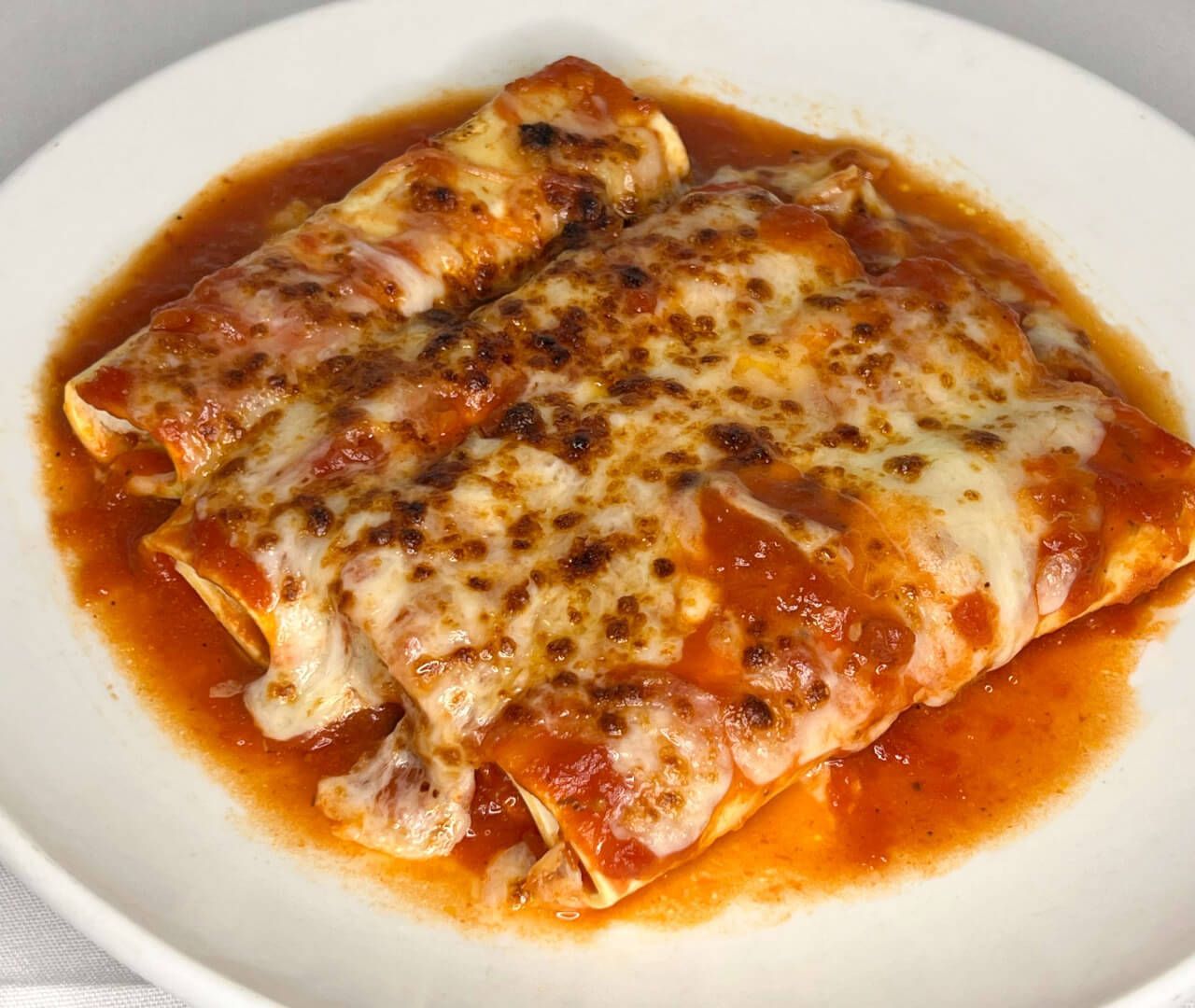 Patricia's of Morris Park signature dishes Baked Clams OreganataChicken ScarparielloCold Antipasto PlatterMargherita Pizza